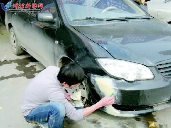 潍坊节后迎汽车维修高峰 车辆扎堆工人忙